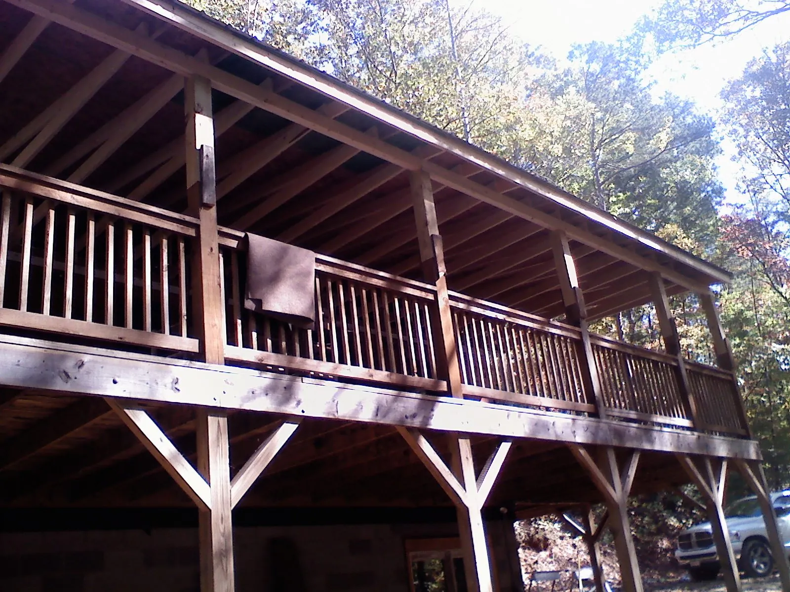 Timber framing under a new elevated porch and deck — Roof Leak Repair in Dorchester Center by Roofing Brothers